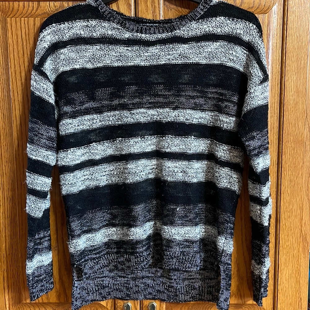 Black and White striped sweater.  Attention Size Small